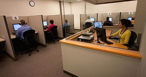 View of the testing room with proctor station at Success Testing